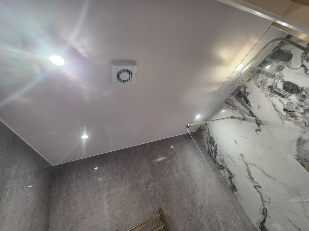 Panelled ceiling with extractor and downlights in the Williams' second Ramsbottom bathroom